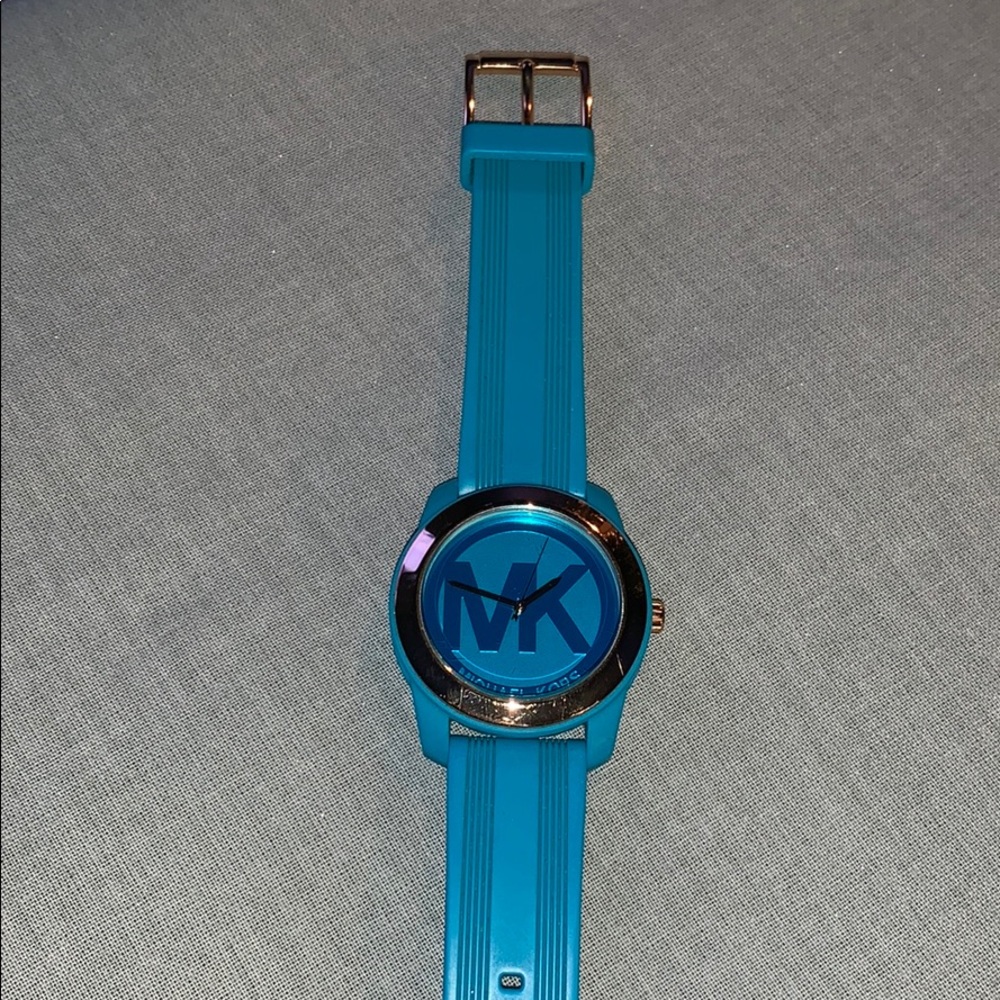 Michael Kors Turquoise and Gold Watch.